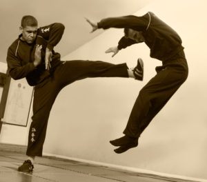 Bedford Wing Chun students train kicks as well as close range hand skills